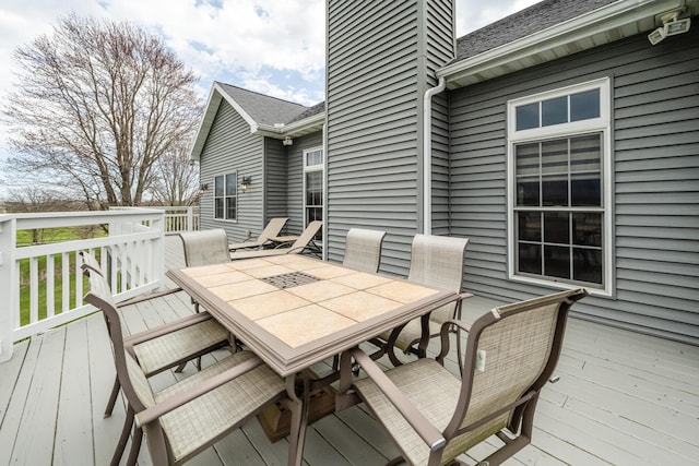 deck featuring outdoor dining space