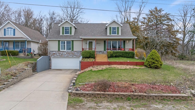 10951 N Waldron Rd, Jerome, MI 49249 - cape cod-style house with concrete driveway, a front lawn, stone siding, covered porch, and a garage