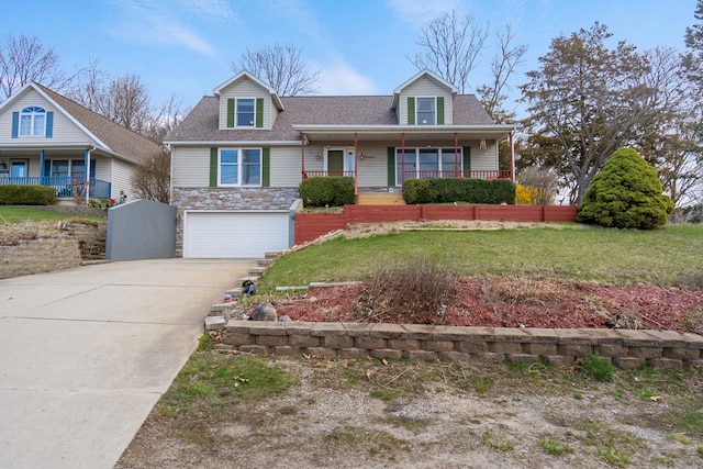 10951 N Waldron Rd, Jerome, MI 49249 - view of front of house featuring a porch, a garage, stone siding, and concrete driveway