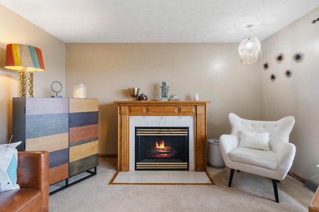 10951 N Waldron Rd, Jerome, MI 49249 - living area featuring baseboards, carpet flooring, and a fireplace