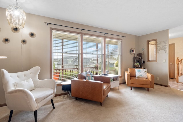10951 N Waldron Rd, Jerome, MI 49249 - living area with baseboards and light colored carpet