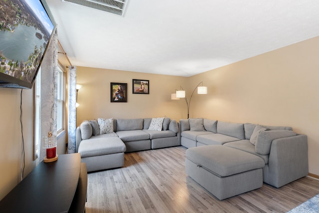 10951 N Waldron Rd, Jerome, MI 49249 - living area with wood finished floors and visible vents
