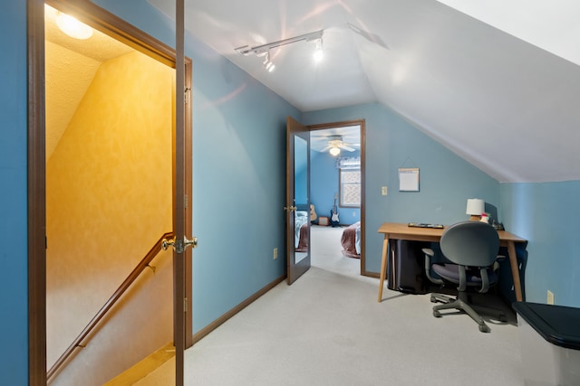 10951 N Waldron Rd, Jerome, MI 49249 - office space with lofted ceiling, rail lighting, and light colored carpet