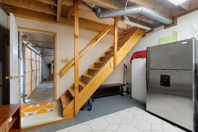 10951 N Waldron Rd, Jerome, MI 49249 - basement with stainless steel fridge with ice dispenser, stairs, and carpet floors