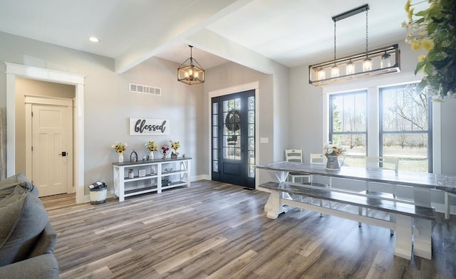 8477 84th St SE, Alto, MI 49302 - foyer featuring recessed lighting, wood finished floors, visible vents, baseboards, and a chandelier