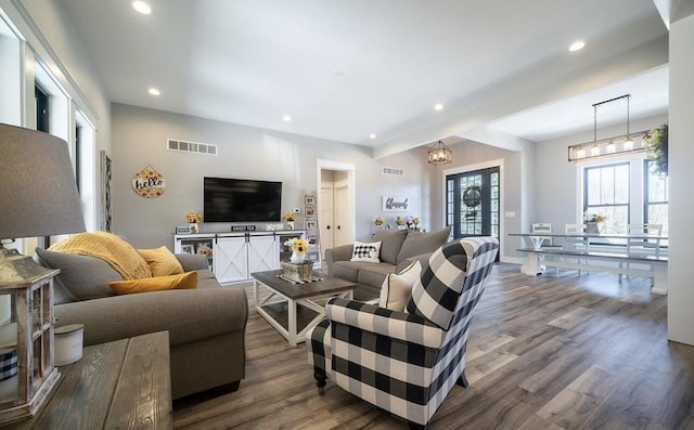 8477 84th St SE, Alto, MI 49302 - living area featuring recessed lighting, visible vents, baseboards, and dark wood-style flooring