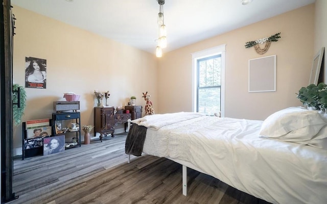 8477 84th St SE, Alto, MI 49302 - bedroom featuring wood finished floors