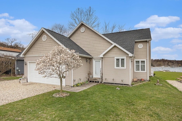 66100 Dolans Ave, Vandalia, MI 49095 - view of front facade with a shingled roof, a front lawn, driveway, and a garage