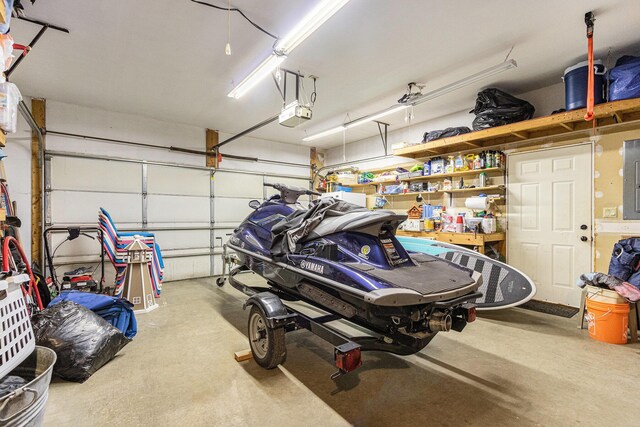 66100 Dolans Ave, Vandalia, MI 49095 - garage featuring a garage door opener