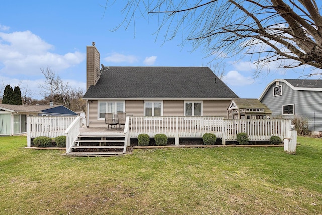66100 Dolans Ave, Vandalia, MI 49095 - rear view of property featuring a wooden deck, a lawn, a chimney, and roof with shingles