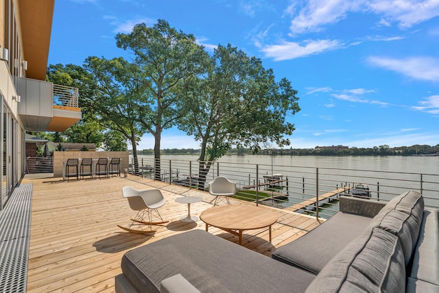 602 Lawn Ave, Holland, MI 49424 - wooden deck with a dock, outdoor dry bar, and a water view