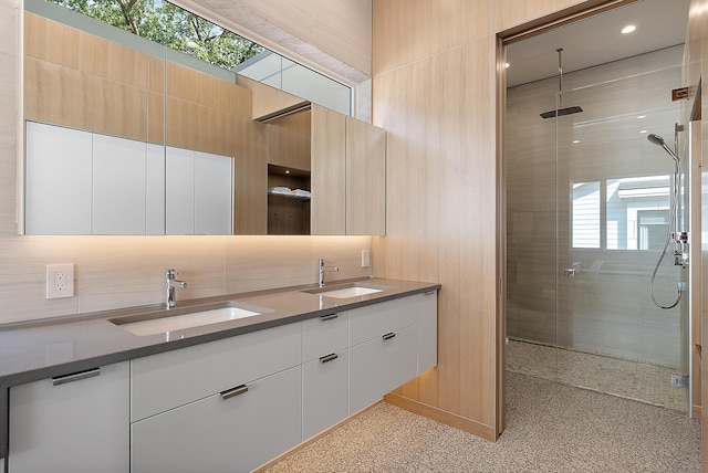 602 Lawn Ave, Holland, MI 49424 - full bath with a sink, double vanity, and a stall shower