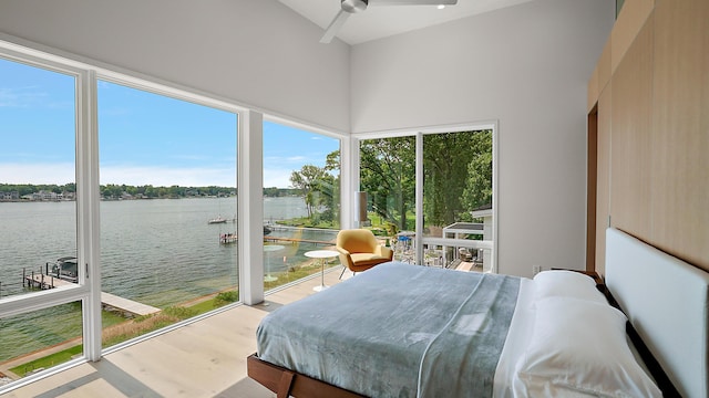 602 Lawn Ave, Holland, MI 49424 - bedroom with a high ceiling, wood finished floors, and a water view