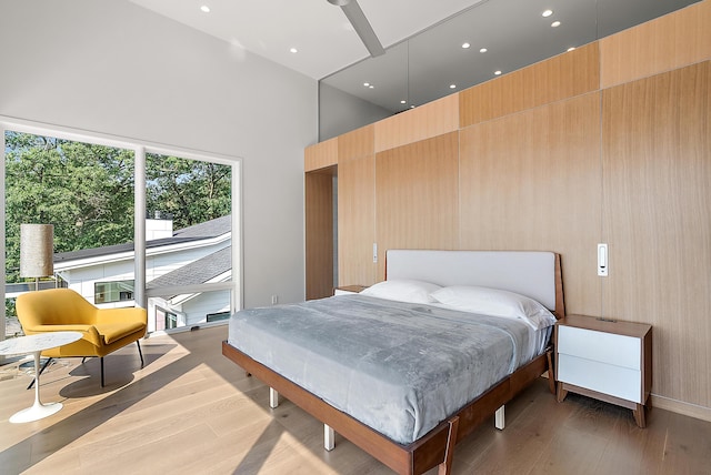 602 Lawn Ave, Holland, MI 49424 - bedroom with wood finished floors, a towering ceiling, and recessed lighting