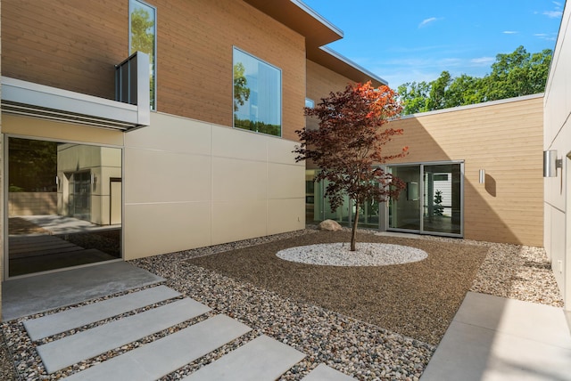602 Lawn Ave, Holland, MI 49424 - view of property exterior featuring a balcony and a patio
