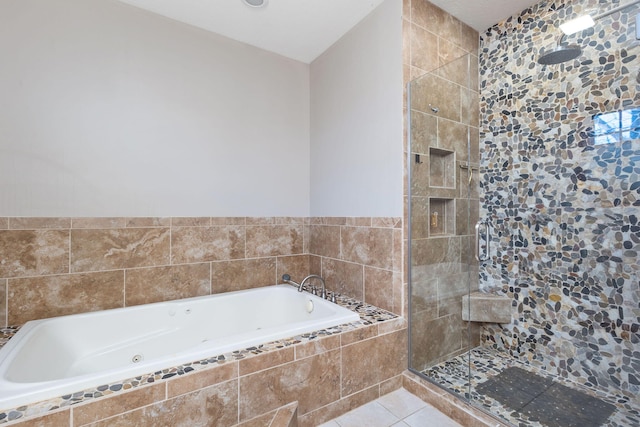 2776 W Hogan Dr, La Porte, IN 46350 - full bath featuring a tub with jets, a tile shower, and tile patterned floors