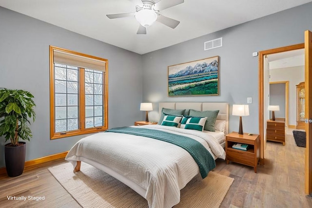 2776 W Hogan Dr, La Porte, IN 46350 - bedroom featuring light wood-type flooring, baseboards, and ceiling fan