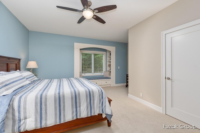 17180 Shore Oaks W Ln, Holland, MI 49424 - bedroom with light colored carpet and ceiling fan