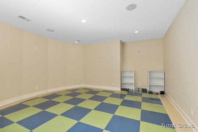 17180 Shore Oaks W Ln, Holland, MI 49424 - unfurnished room featuring tile patterned floors and recessed lighting