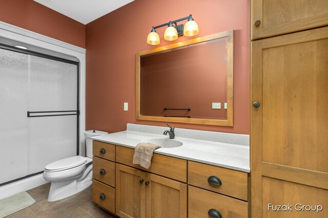 17180 Shore Oaks W Ln, Holland, MI 49424 - full bathroom featuring vanity, tile patterned flooring, and a shower