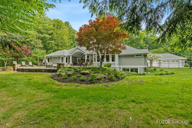 17180 Shore Oaks W Ln, Holland, MI 49424 - rear view of property with a patio area