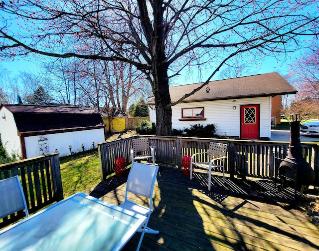 deck with an outbuilding