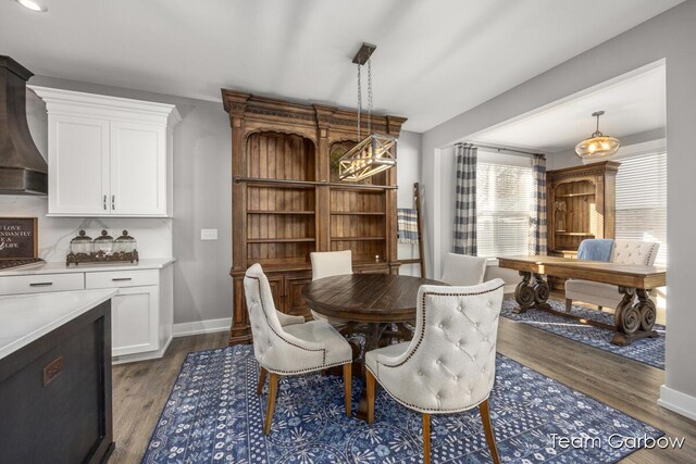 8393 Woodhaven Dr SW Unit 01, Byron Center, MI 49315 - dining room with wood finished floors and baseboards