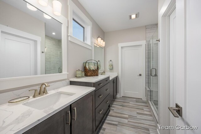 8393 Woodhaven Dr SW Unit 01, Byron Center, MI 49315 - full bathroom featuring a shower stall, vanity, and visible vents