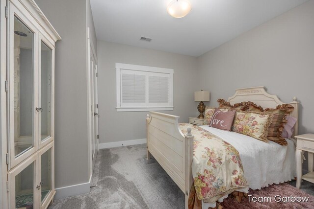 8393 Woodhaven Dr SW Unit 01, Byron Center, MI 49315 - carpeted bedroom with baseboards and visible vents