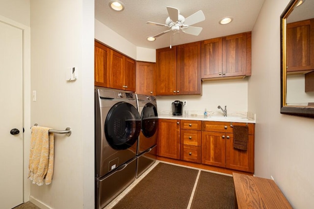 laundry area featuring a ceiling fan, a sink, independent washer and dryer, cabinet space, and recessed lighting