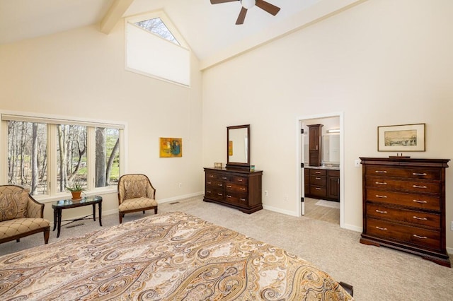 sitting room with high vaulted ceiling, light carpet, a ceiling fan, and a healthy amount of sunlight