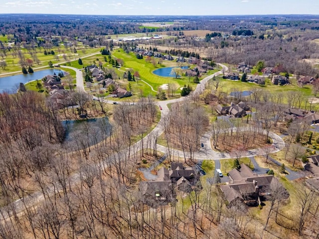bird's eye view with golf course view, a residential view, and a water view