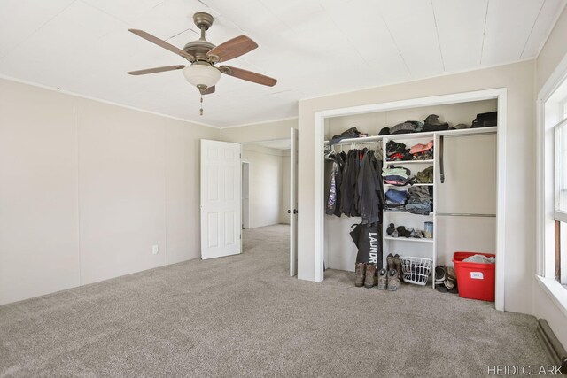 3552 47th St, Hamilton, MI 49419 - bedroom with a closet, multiple windows, a ceiling fan, and carpet floors
