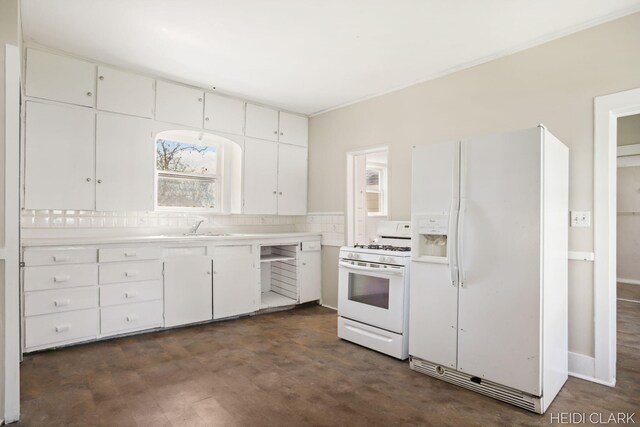 3552 47th St, Hamilton, MI 49419 - kitchen featuring light countertops, a sink, white cabinetry, and white appliances