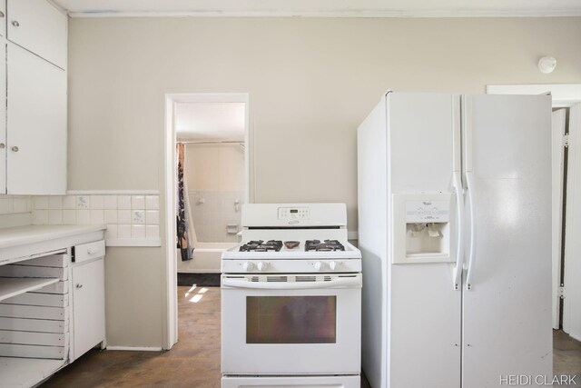 3552 47th St, Hamilton, MI 49419 - kitchen with white cabinetry, white appliances, dark wood finished floors, and light countertops