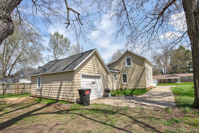 3552 47th St, Hamilton, MI 49419 - view of side of home with fence and concrete driveway