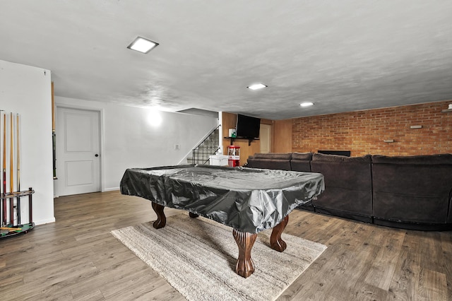 419 Larkspur Ave, Portage, MI 49002 - rec room with brick wall, baseboards, wood finished floors, and billiards