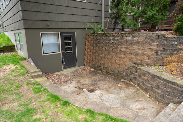 419 Larkspur Ave, Portage, MI 49002 - doorway to property featuring stucco siding