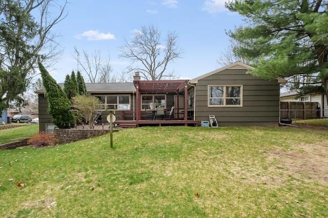 419 Larkspur Ave, Portage, MI 49002 - back of house featuring a yard, fence, and a deck