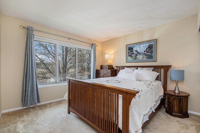 2420 E Collier Ave SE, Grand Rapids, MI 49546 - carpeted bedroom featuring baseboards