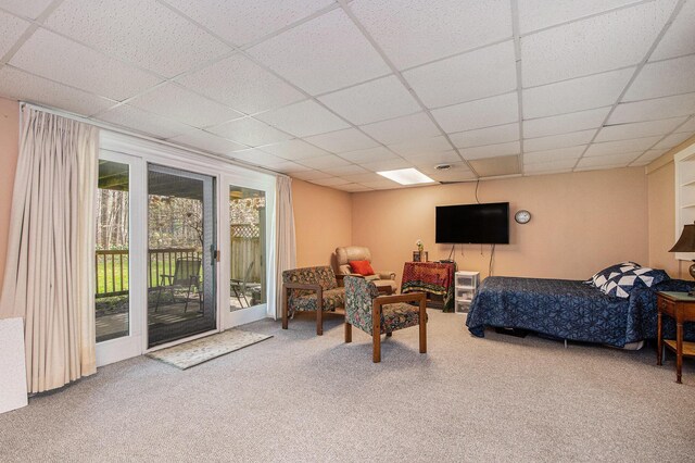 2420 E Collier Ave SE, Grand Rapids, MI 49546 - carpeted bedroom featuring a drop ceiling and access to exterior