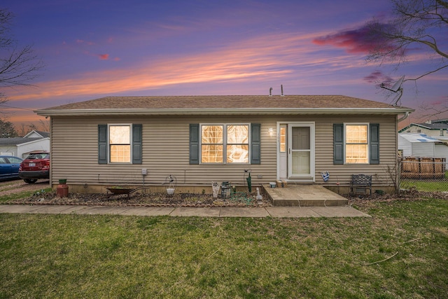 103 S Leeth St, White Pigeon, MI 49099 - view of front of property featuring roof with shingles, a front lawn, and fence