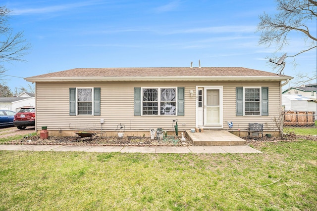 103 S Leeth St, White Pigeon, MI 49099 - view of front of property with fence, roof with shingles, and a front yard