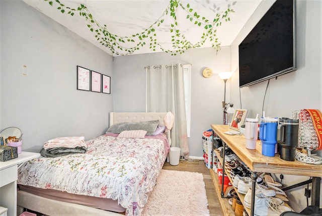103 S Leeth St, White Pigeon, MI 49099 - bedroom featuring baseboards and wood finished floors