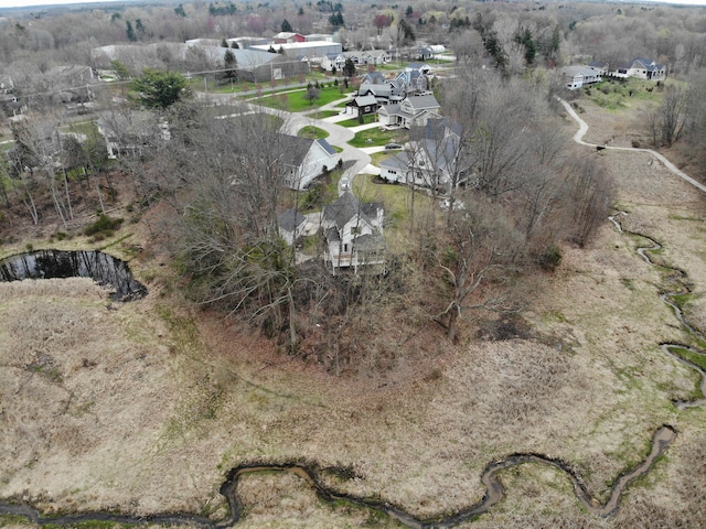 birds eye view of property with a residential view