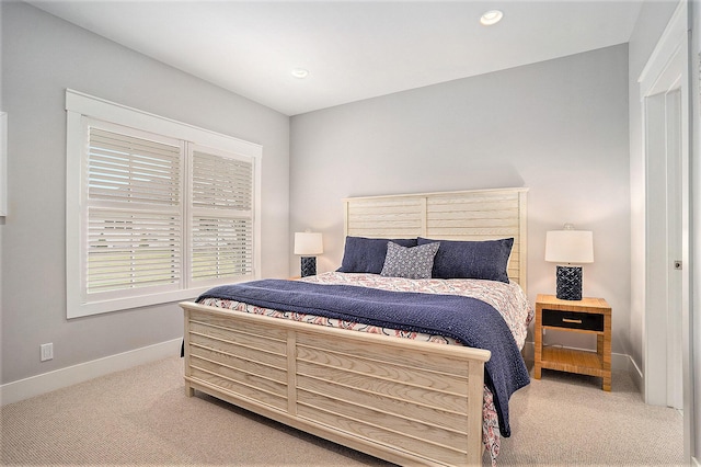 bedroom featuring baseboards, carpet flooring, and recessed lighting