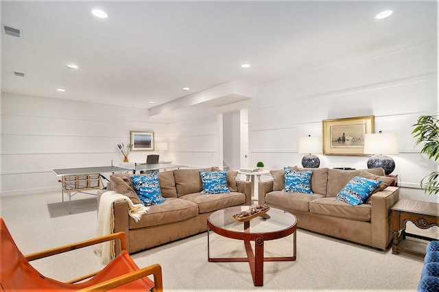 living area with visible vents and recessed lighting
