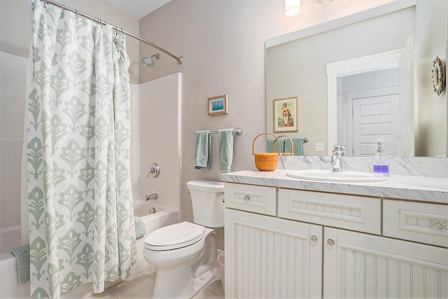 full bath with vanity, tile patterned floors, shower / bath combo, and toilet