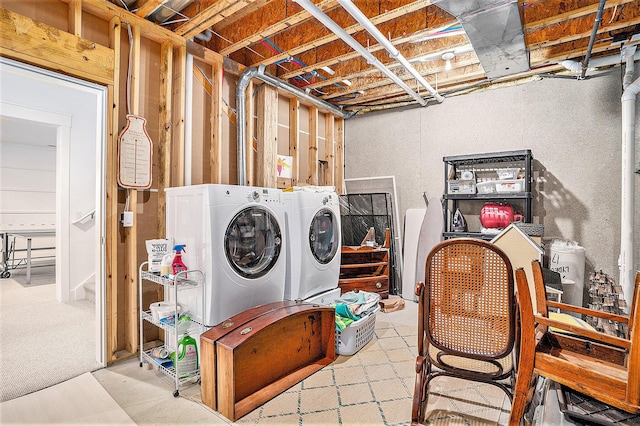 laundry area with washing machine and dryer and laundry area
