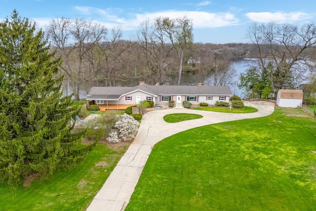 11886 Riverside Dr, White Pigeon, MI 49099 - view of front of home with a front yard and curved driveway